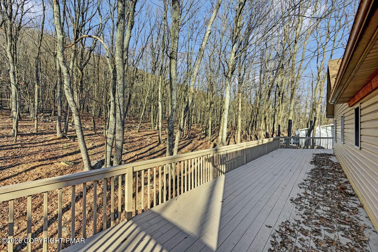 171 Foothill Boulevard Effort, PA 18330 - Photo 54 of 61 a view of a balcony with wooden floor and fence