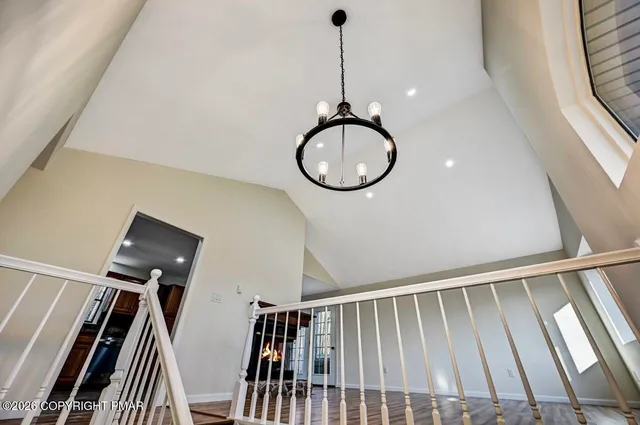 a view of kitchen with furniture and wooden floor