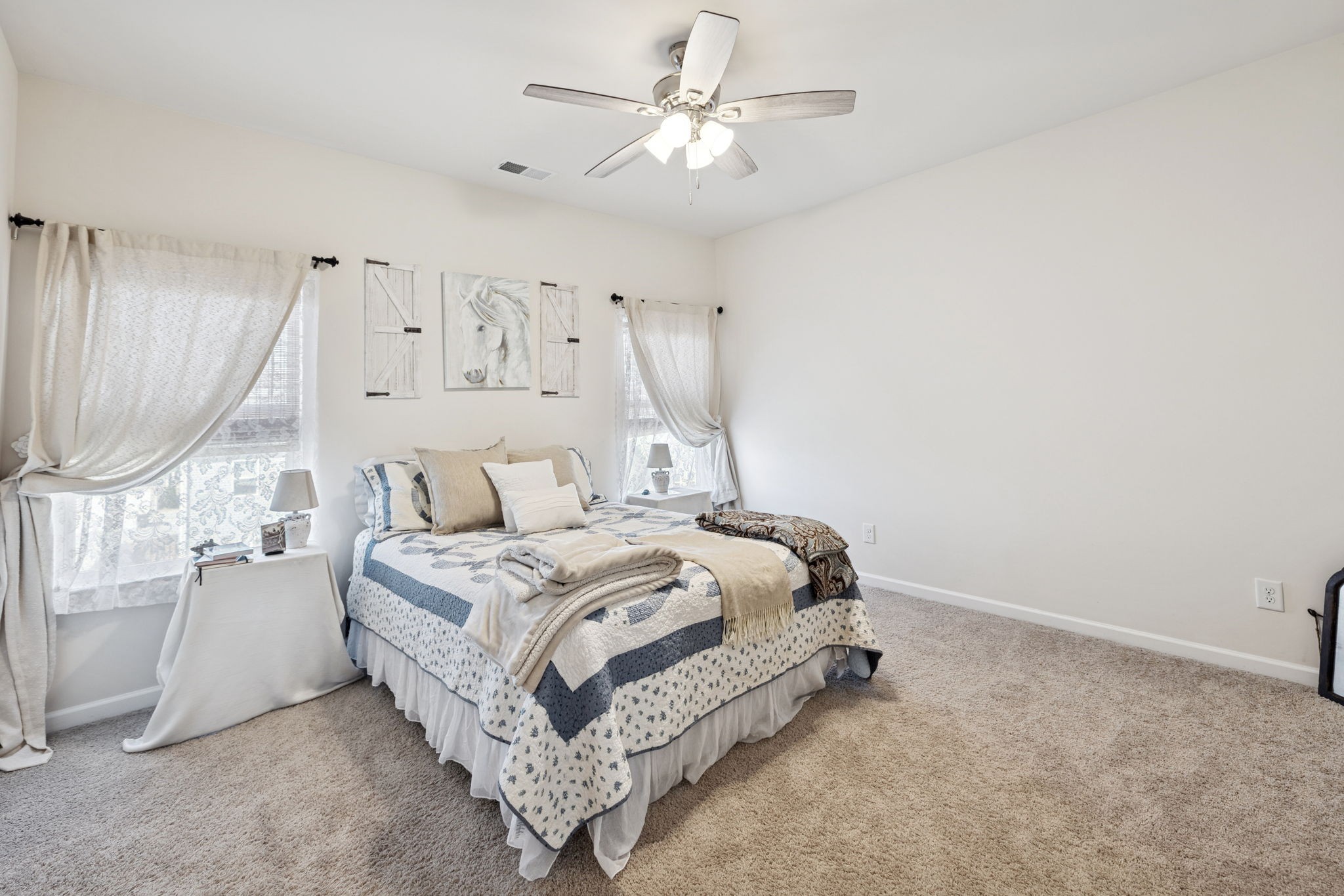 2605 Sherman Way Columbia, TN 38401 - Photo 11 of 22 a bed room with a bed and a chandelier