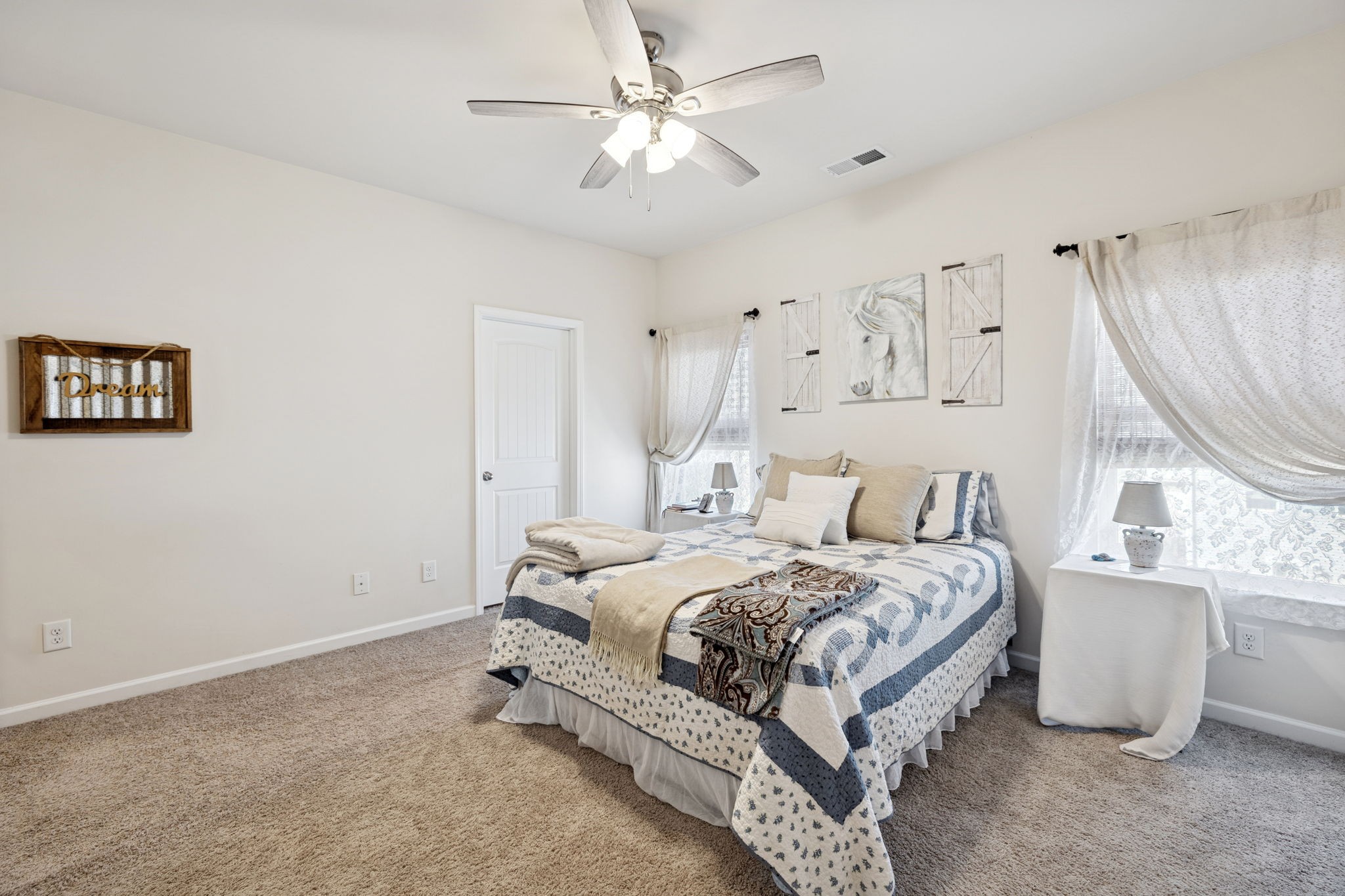 2605 Sherman Way Columbia, TN 38401 - Photo 12 of 22 a bed room with a bed and a chandelier