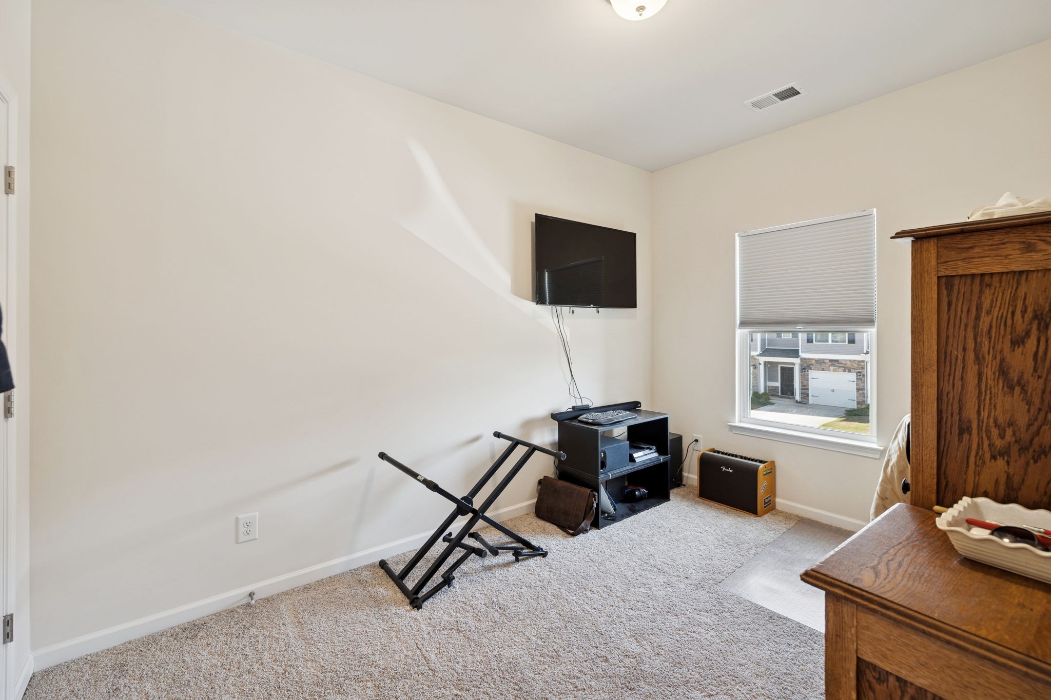 2605 Sherman Way Columbia, TN 38401 - Photo 17 of 22 a living room with furniture a flat screen tv and a window