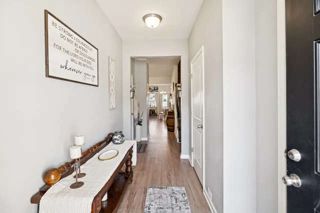 a view of a hallway with a workspace
