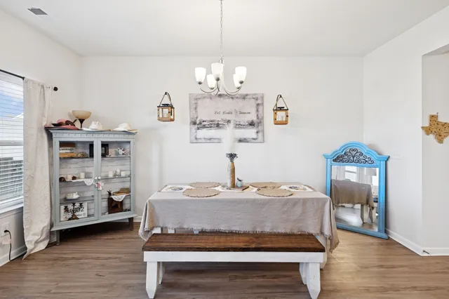 a bed room with a bed and a table