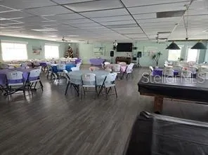 a living room with lots of furniture and a flat screen tv