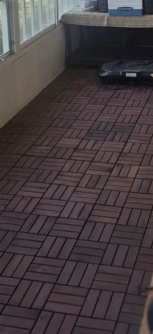 a living room with a wooden floor