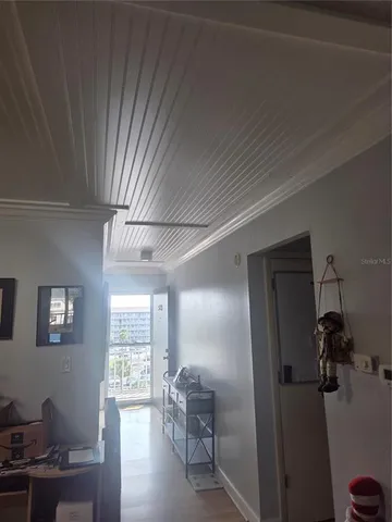 a view of a room that has a window in it