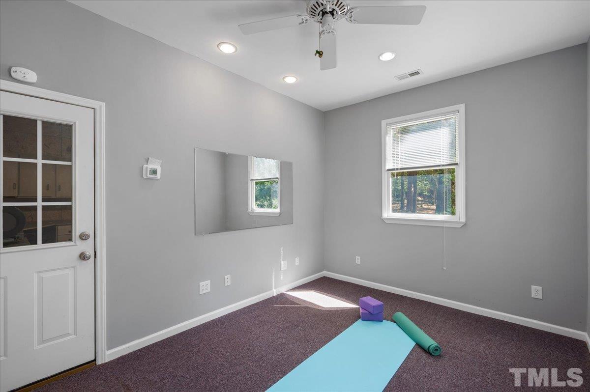5116 Hallmark Road Durham, NC 27712 - Photo 20 of 31 a view of an empty room with a window