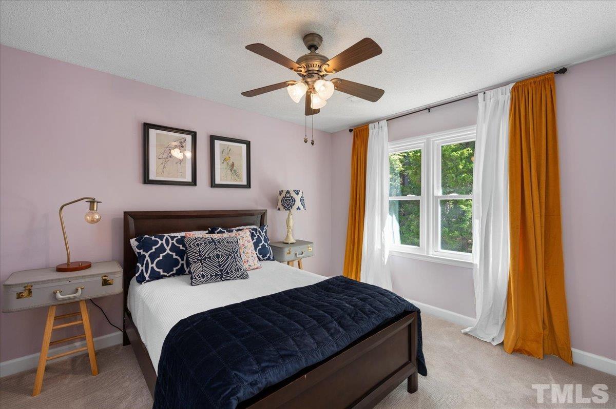 5116 Hallmark Road Durham, NC 27712 - Photo 23 of 31 a bedroom with a bed and window