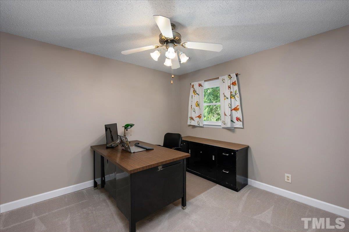 5116 Hallmark Road Durham, NC 27712 - Photo 26 of 31 a room with window and ceiling fan