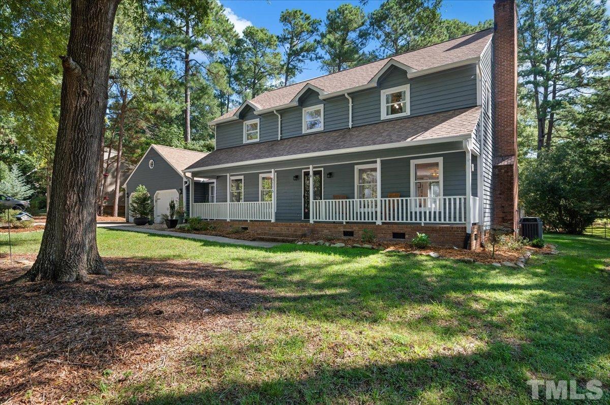 5116 Hallmark Road Durham, NC 27712 - Photo 8 of 31 a front view of a house with a yard