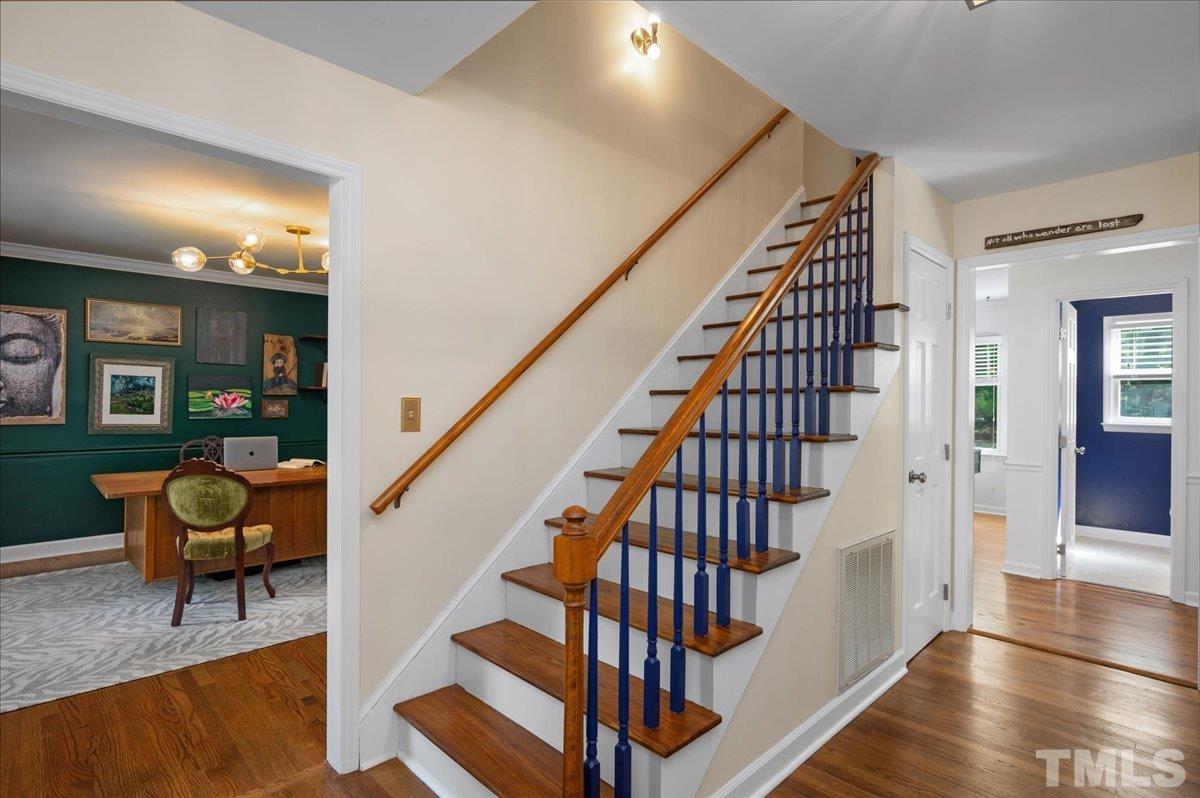 5116 Hallmark Road Durham, NC 27712 - Photo 9 of 31 a view of entryway and hall with wooden floor