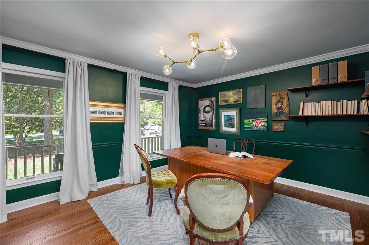 5116 Hallmark Road Durham, NC 27712 - Photo 10 of 31 a view of a dining room with furniture window and wooden floor