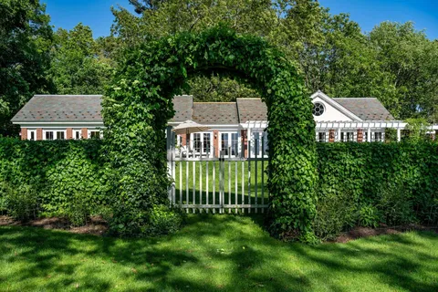 a view of a back yard and green space