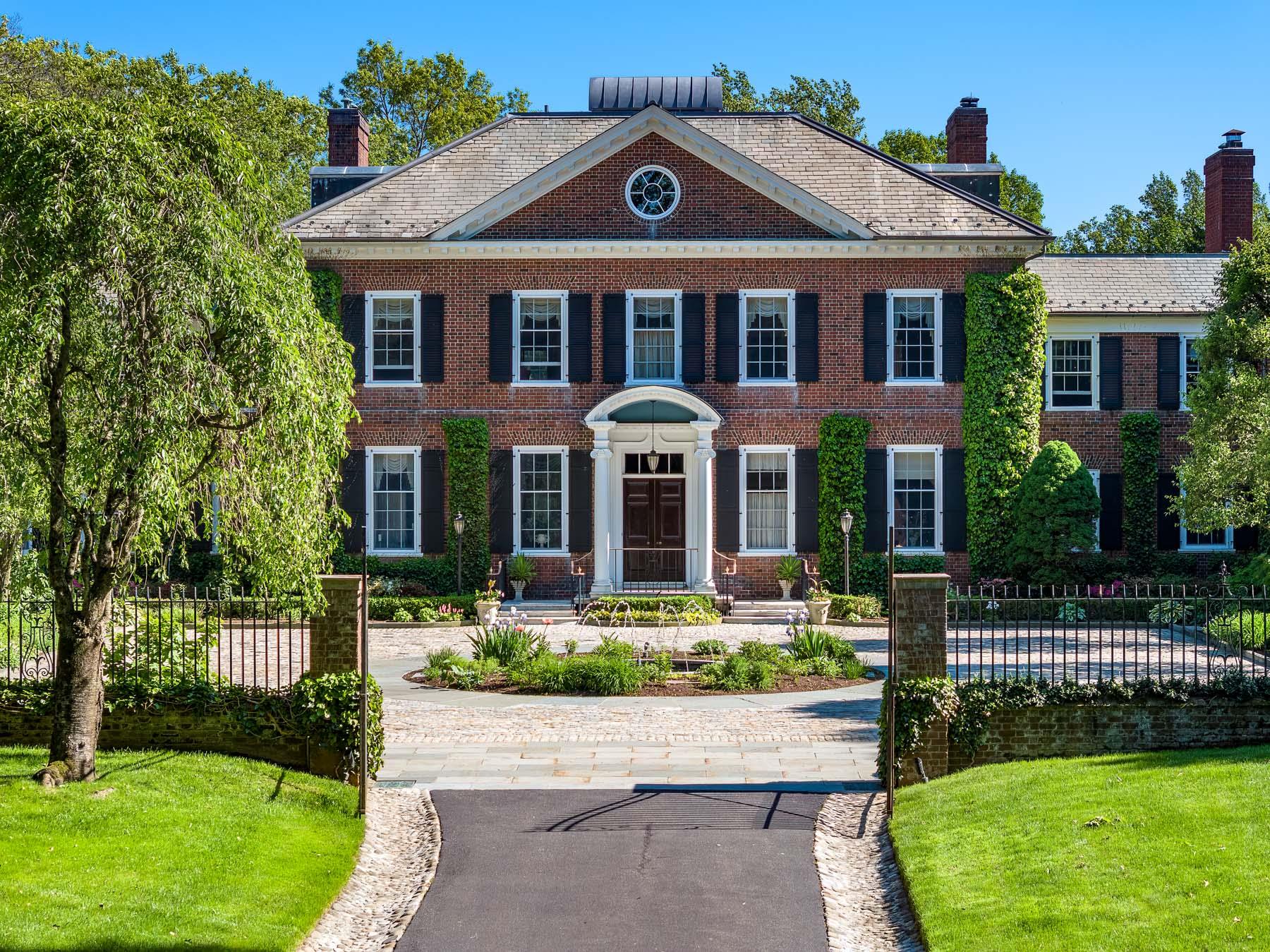 842 Sleepy Hollow Road Briarcliff Manor, NY 10510 - Photo 2 of 35 a front view of a house with a yard
