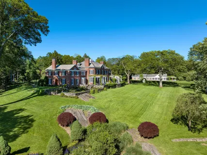 a view of a house with a big yard