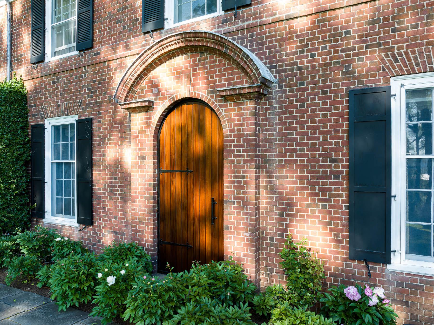 842 Sleepy Hollow Road Briarcliff Manor, NY 10510 - Photo 5 of 35 a view of a brick house with potted plants