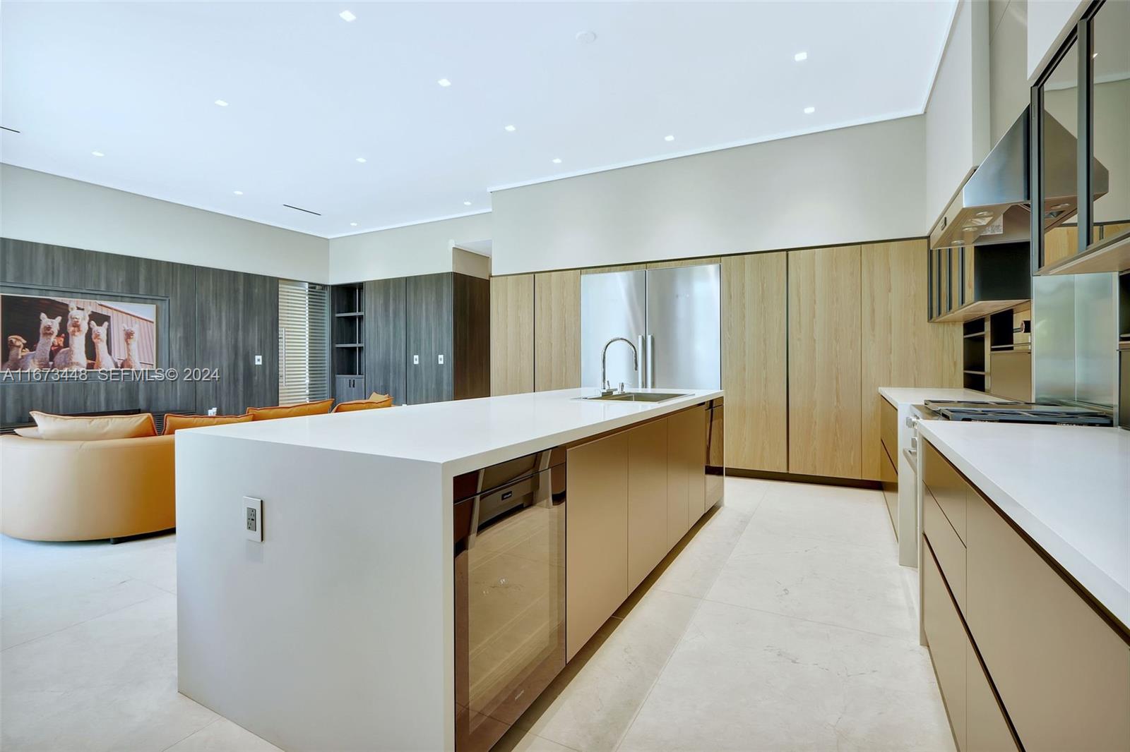 9860 Northeast 5th Avenue Road Miami Shores, FL 33138 - Photo 28 of 56 a large kitchen with a large counter top space