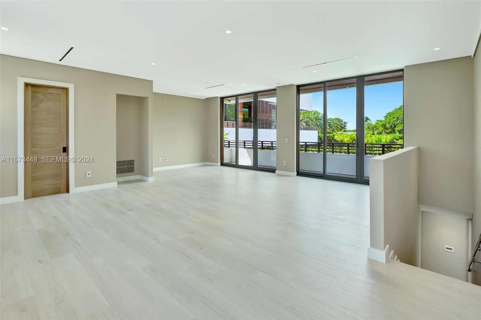 9860 Northeast 5th Avenue Road Miami Shores, FL 33138 - Photo 51 of 56 a view of an empty room with a window