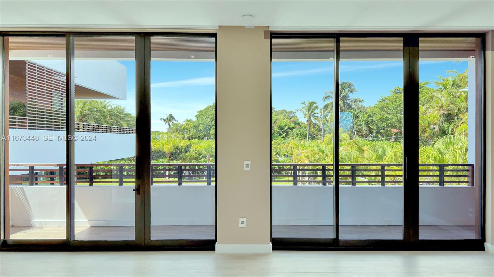 9860 Northeast 5th Avenue Road Miami Shores, FL 33138 - Photo 52 of 56 a view of a large window with an outdoor view