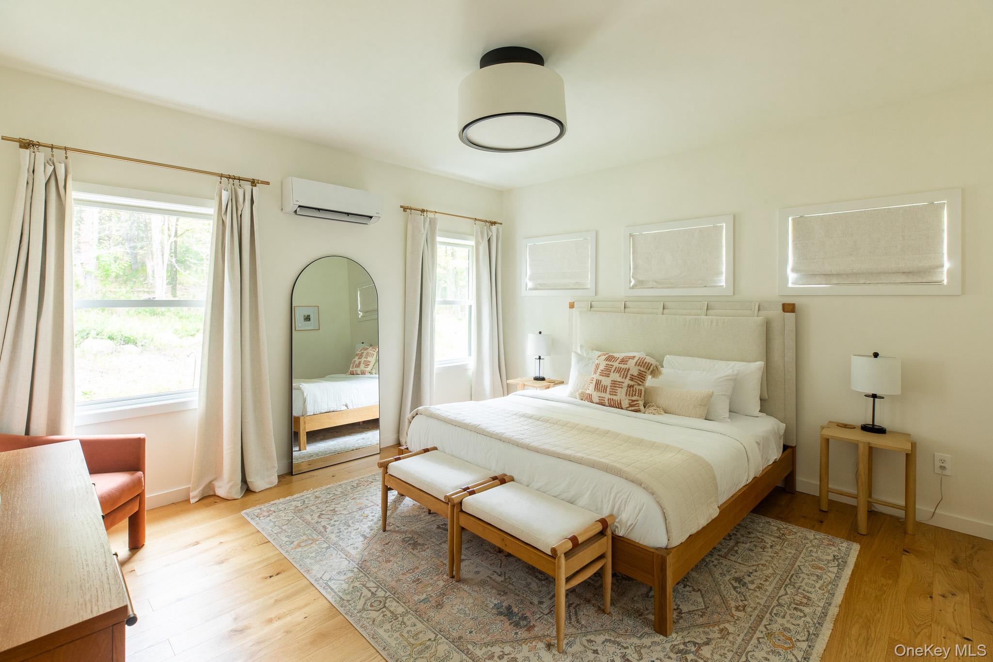 483 Acorn Hill Road Olivebridge, NY 12461 - Photo 23 of 50 Bedroom with light wood finished floors and a wall mounted air conditioner