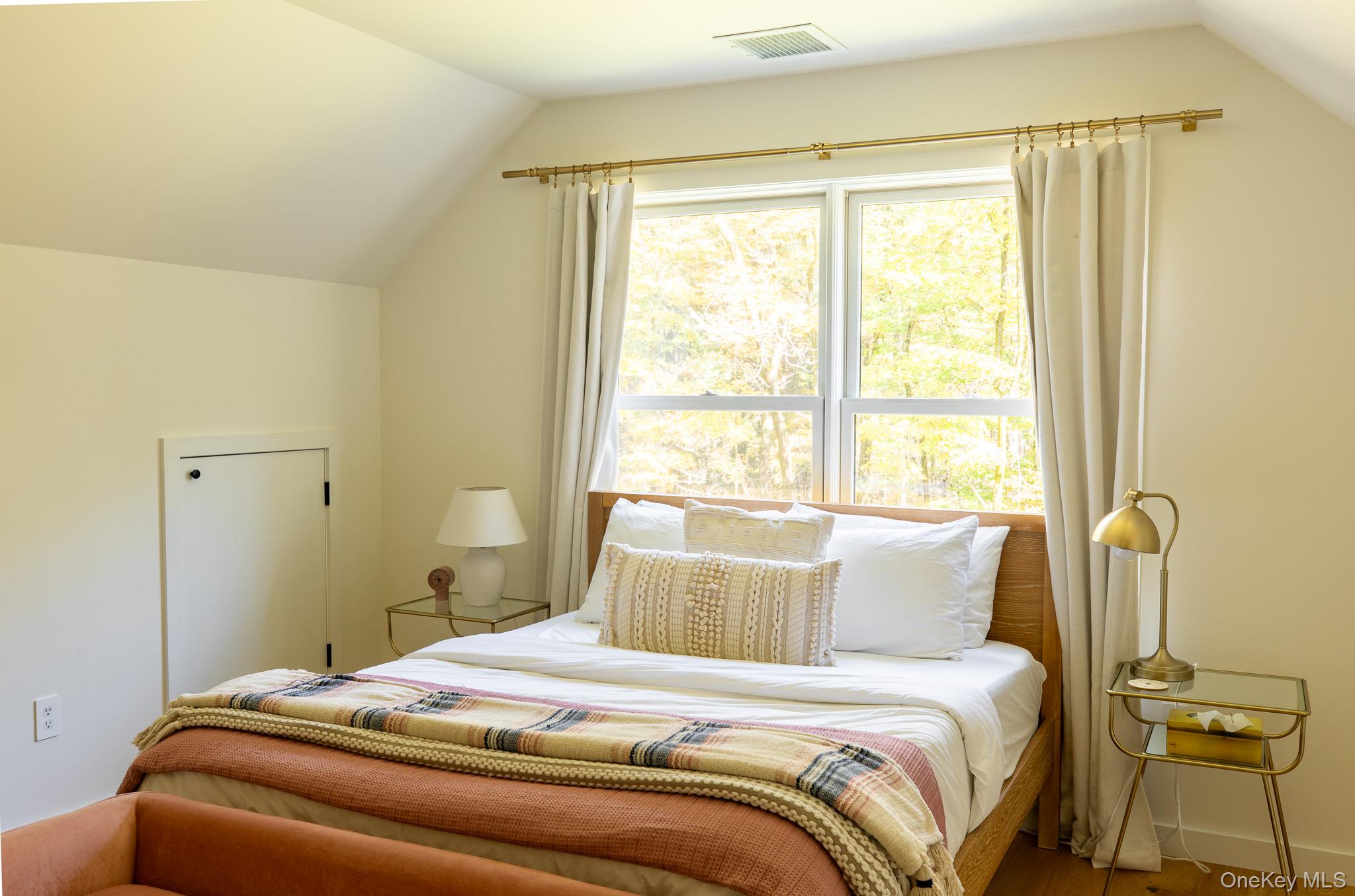 483 Acorn Hill Road Olivebridge, NY 12461 - Photo 29 of 50 Bedroom with vaulted ceiling and wood finished floors