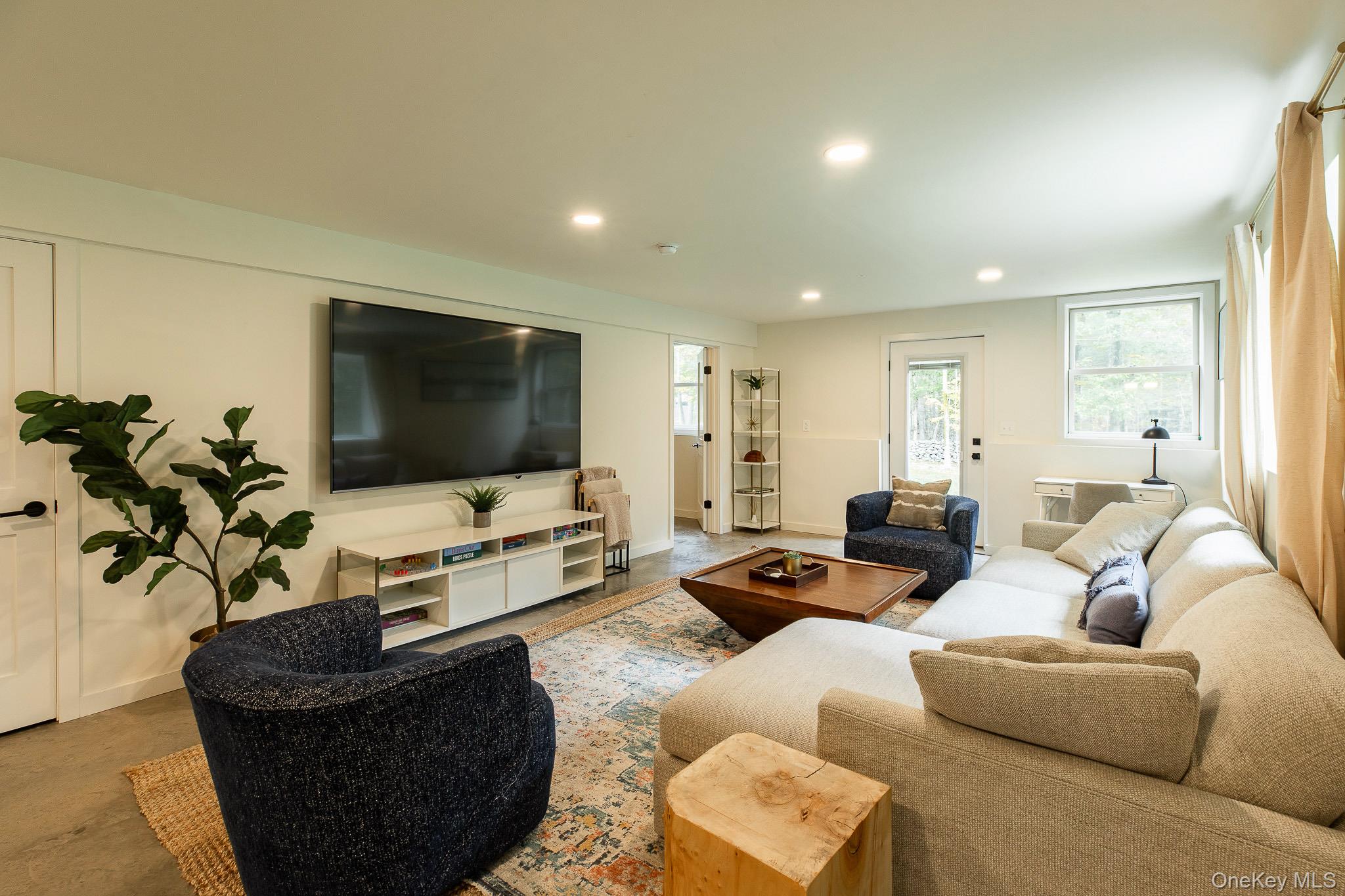 483 Acorn Hill Road Olivebridge, NY 12461 - Photo 36 of 50 Living area featuring recessed lighting and finished concrete floors