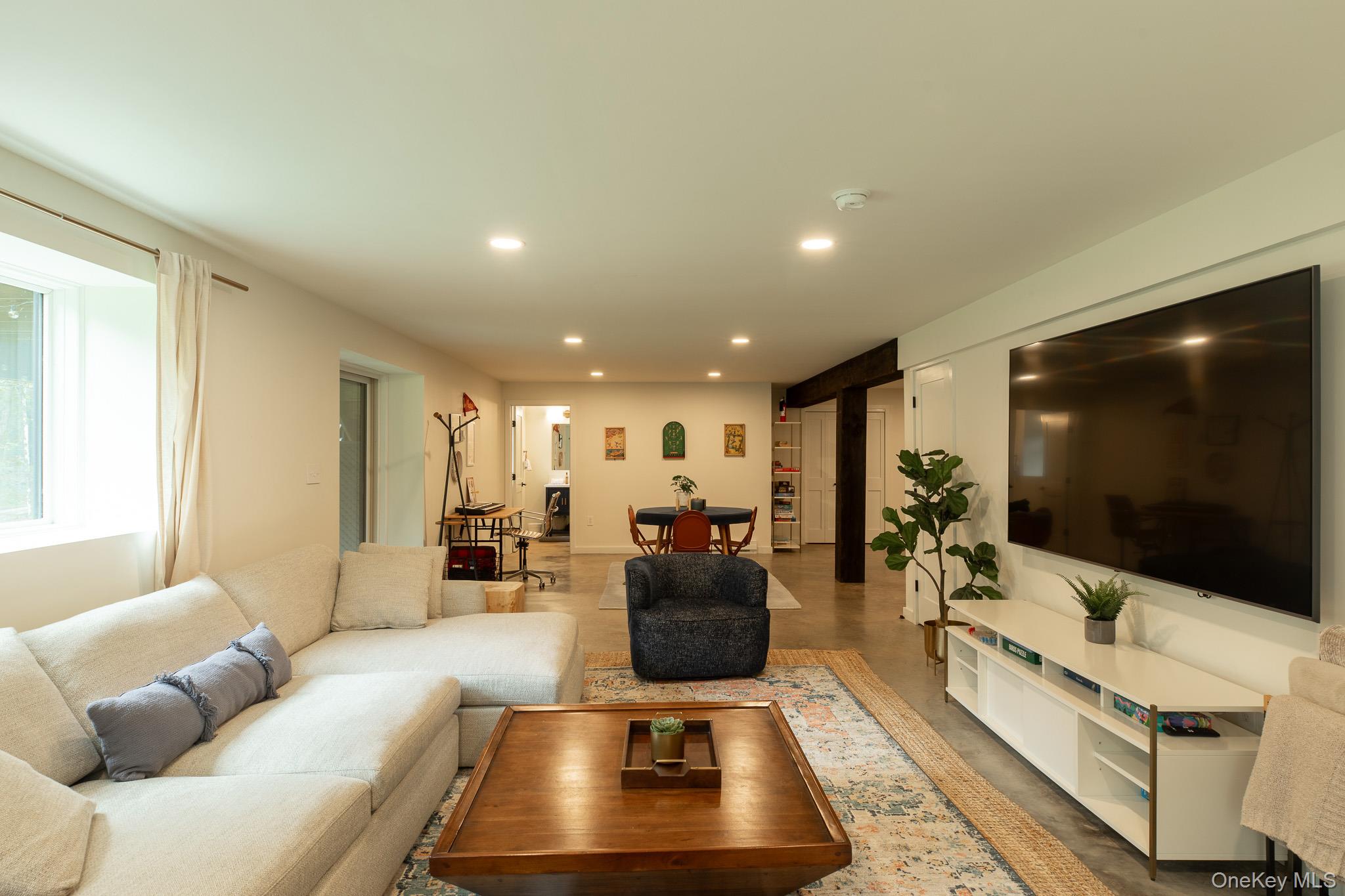 483 Acorn Hill Road Olivebridge, NY 12461 - Photo 37 of 50 Living room featuring recessed lighting and concrete flooring