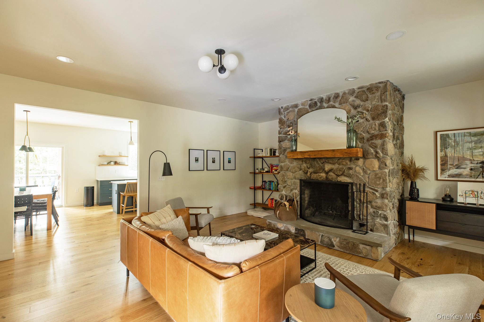 483 Acorn Hill Road Olivebridge, NY 12461 - Photo 10 of 50 Living area featuring light wood finished floors, a stone fireplace, and recessed lighting