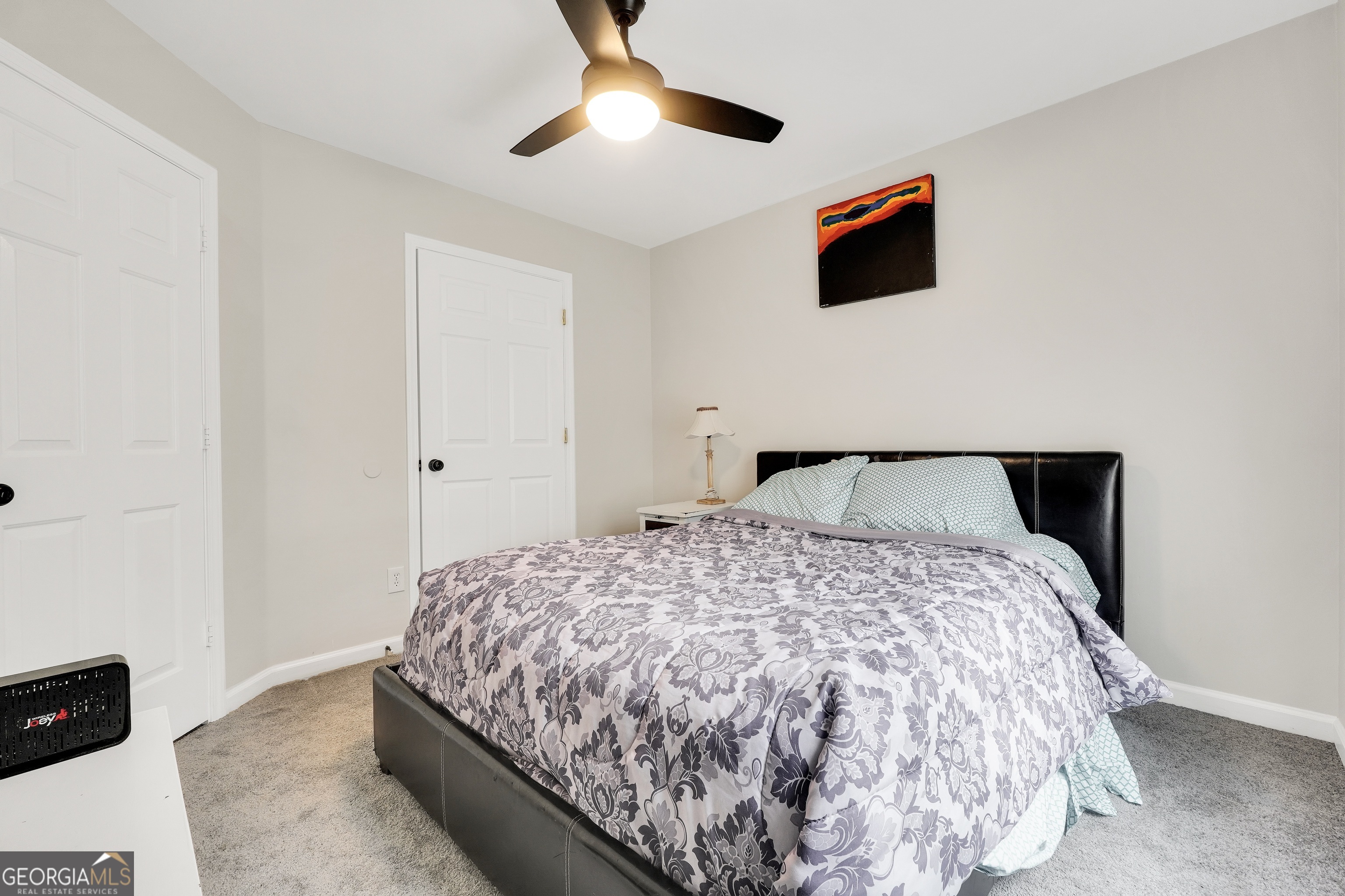 110 Westeria Way Jackson, GA 30233 - Photo 22 of 45 a bedroom with a bed and tv