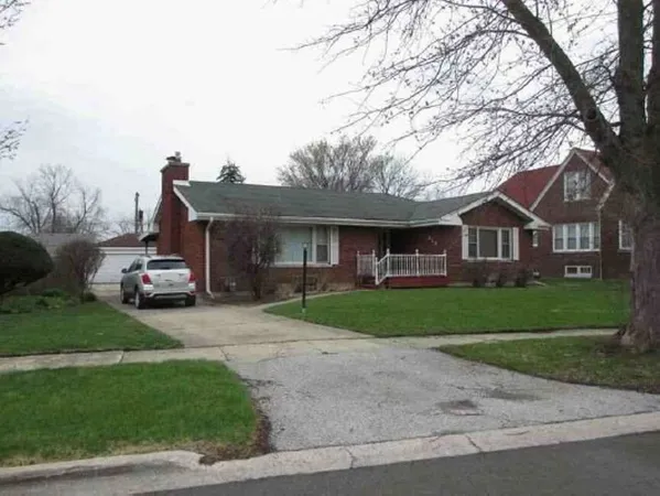 a car parked in front of a house