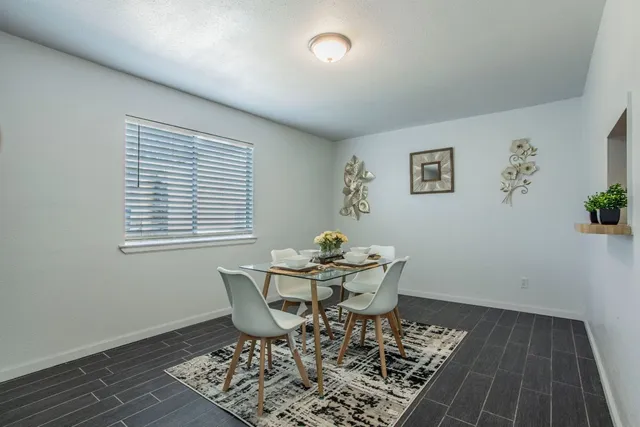 a dining room with a table and chair
