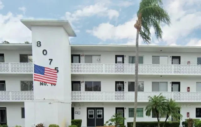 a front view of a multi story residential apartment building