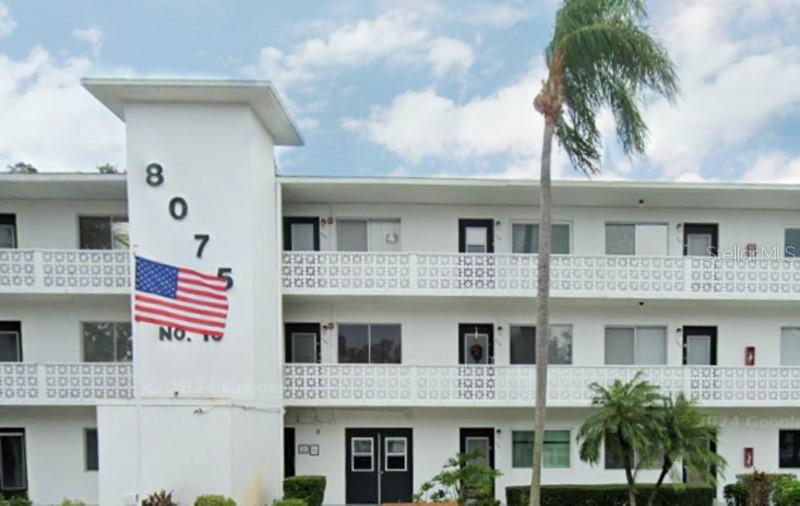a front view of a multi story residential apartment building