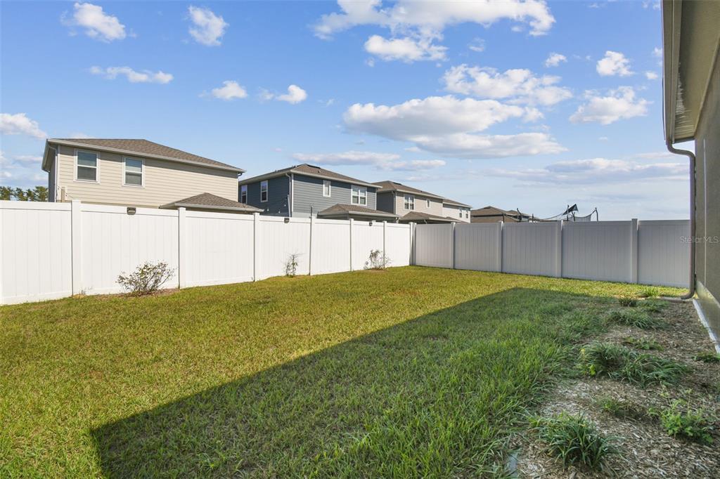 19043 Pebble Wood Ln Spring Hill Spring Hill, FL 34610 - Photo 32 of 35 a view of a backyard