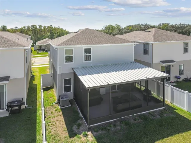 a view of a house with swimming pool