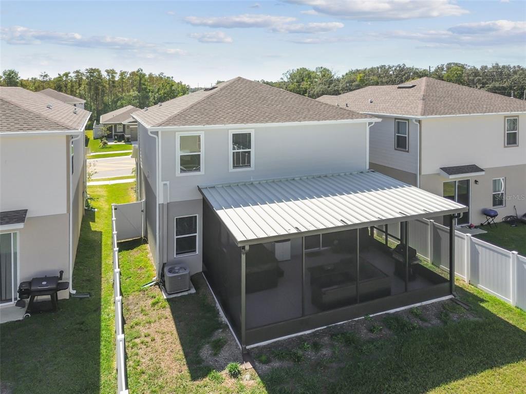 19043 Pebble Wood Ln Spring Hill Spring Hill, FL 34610 - Photo 33 of 35 a view of a house with swimming pool