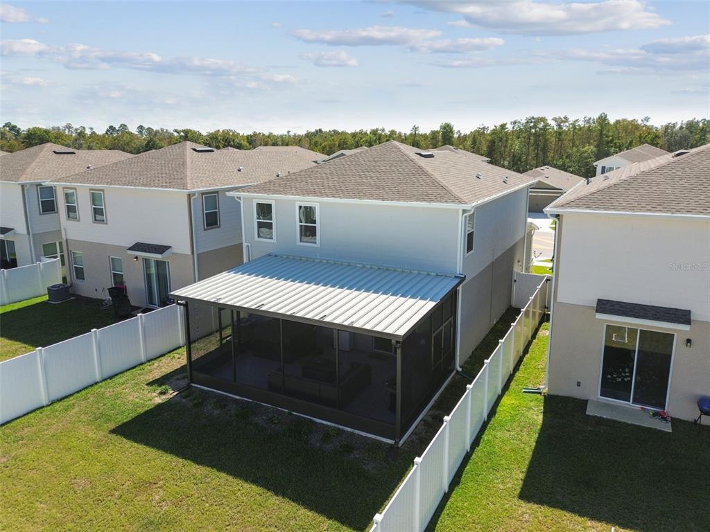 19043 Pebble Wood Ln Spring Hill Spring Hill, FL 34610 - Photo 34 of 35 a terrace view with sitting space and garden view
