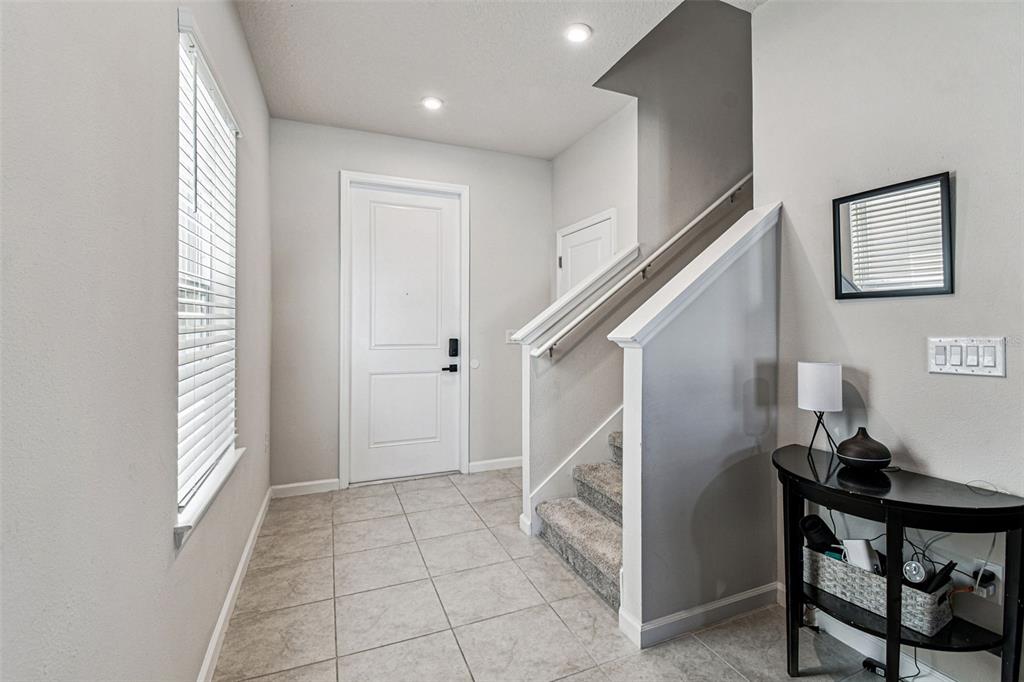 19043 Pebble Wood Ln Spring Hill Spring Hill, FL 34610 - Photo 4 of 35 a view of entryway with a workspace