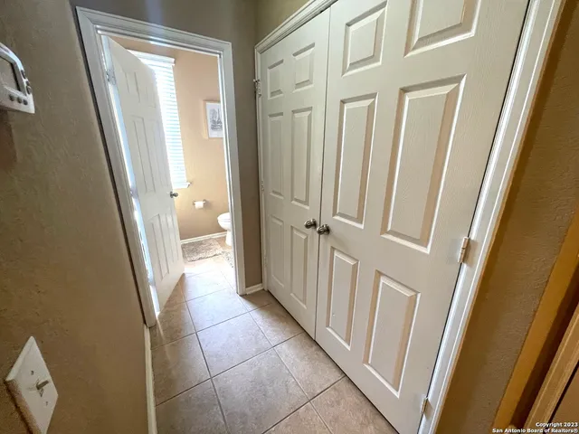 a bathroom with a sink and a glass door shower
