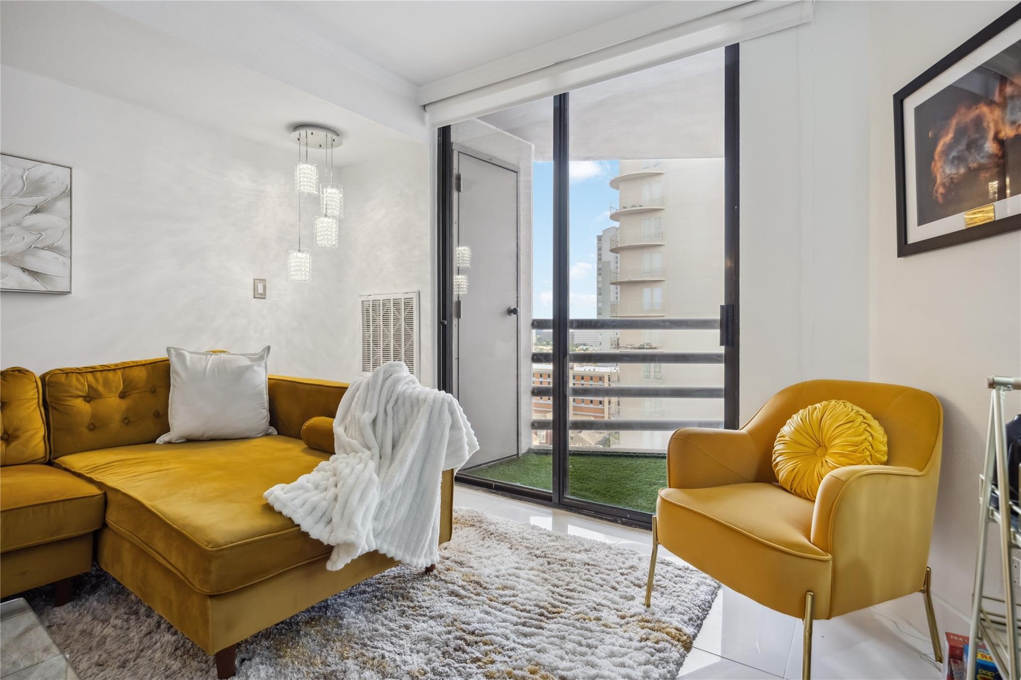 3525 Sage Road, Unit 1713 Houston, TX 77056 - Photo 6 of 25 Living space with direct access to your private balcony—perfect for enjoying fresh air and stunning city views.