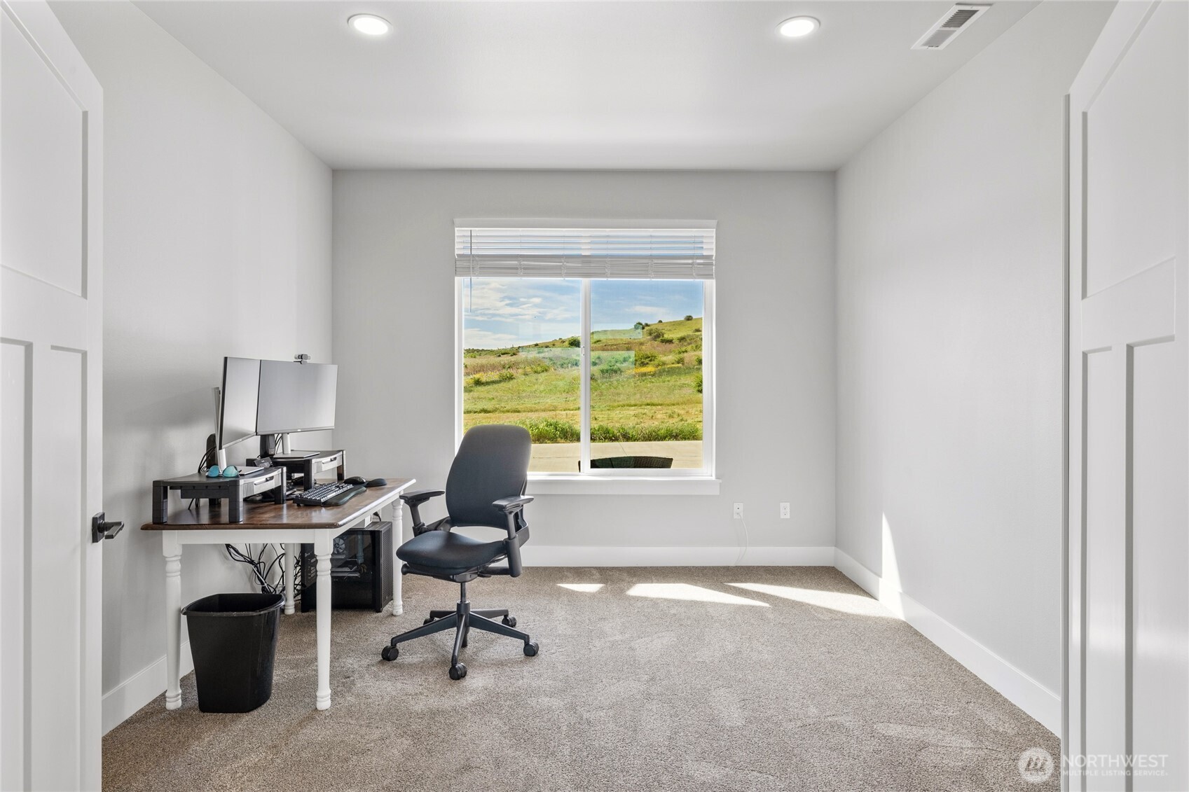 1590 Hunter Road Ellensburg, WA 98926 - Photo 21 of 40 a view of a workspace with furniture and a window