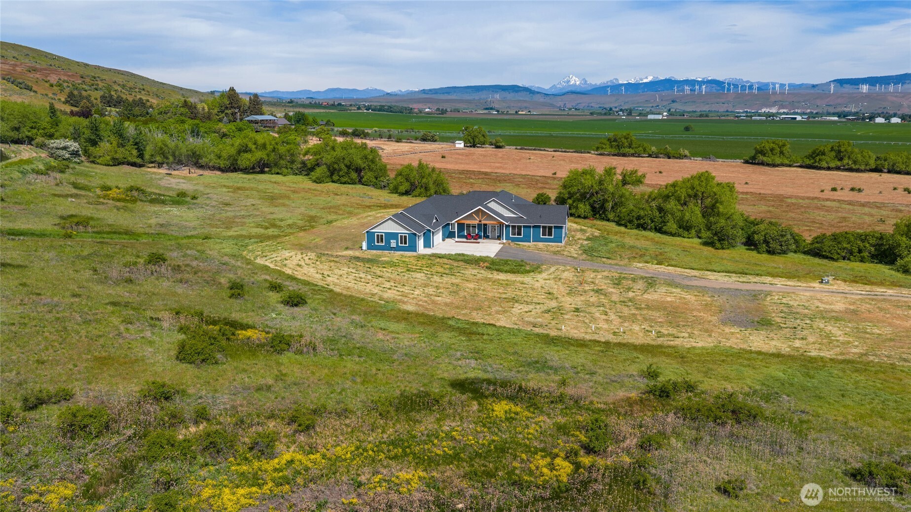 1590 Hunter Road Ellensburg, WA 98926 - Photo 4 of 40 a view of a lake with a mountain in the background