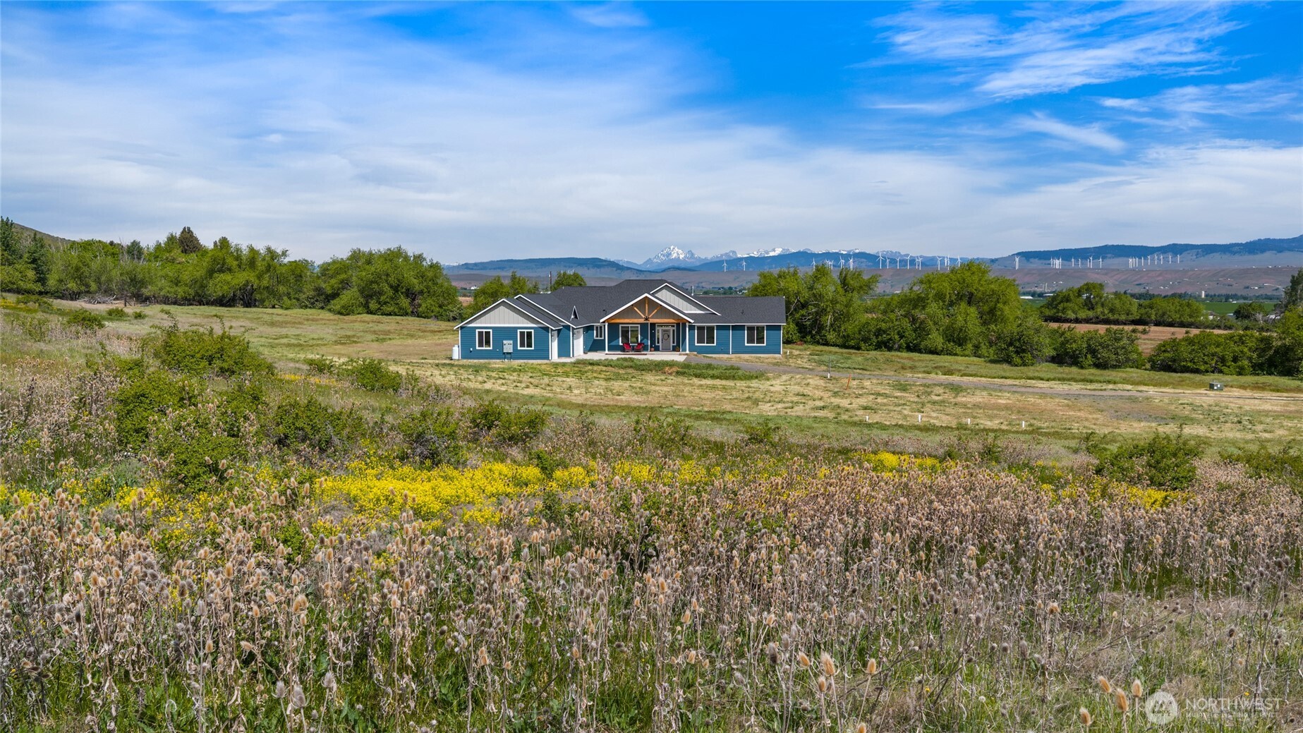 1590 Hunter Road Ellensburg, WA 98926 - Photo 5 of 40 a view of a lake with houses in the back