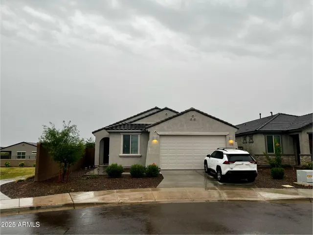 a car parked in front of a house