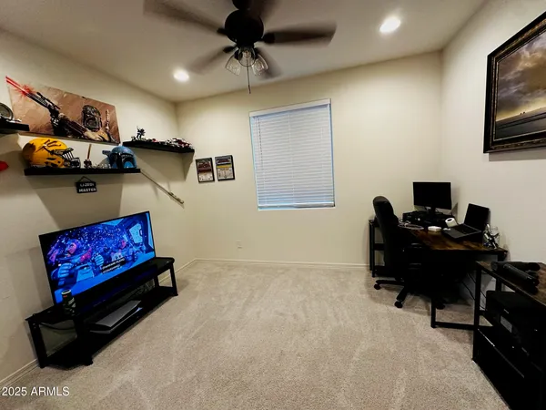 a room with furniture and a flat screen tv