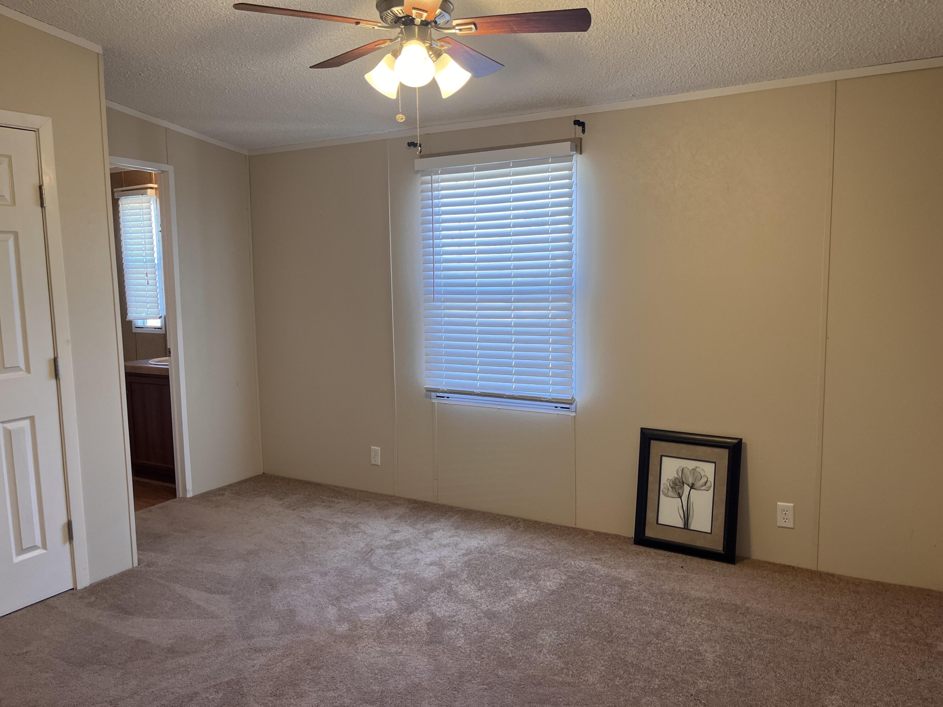 35 Rangeview Road Spur, TX 79370 - Photo 17 of 36 an empty room with a window