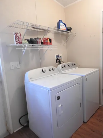 a view of a field with an trees