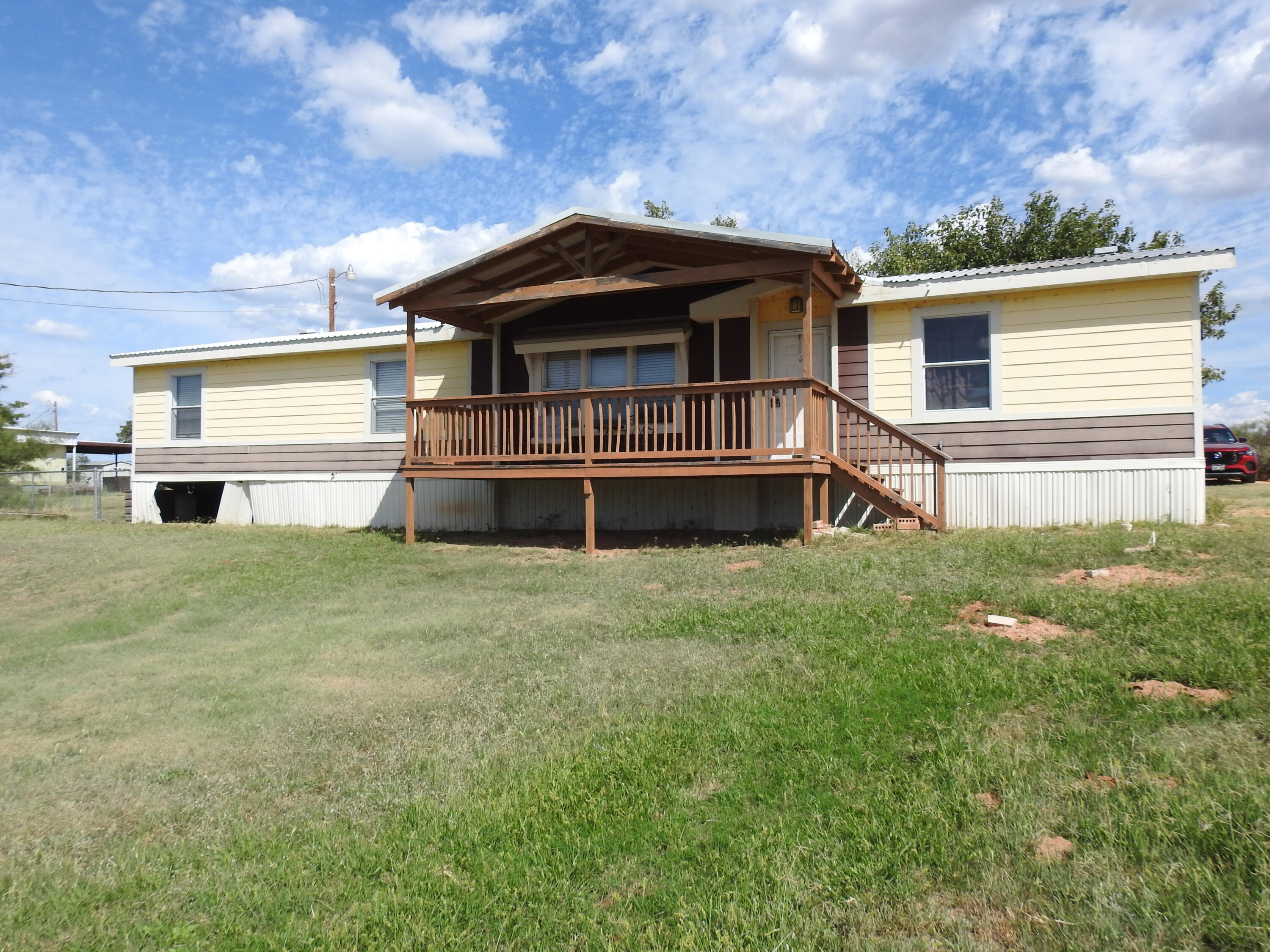 35 Rangeview Road Spur, TX 79370 - Photo 24 of 34 front view of house with a yard