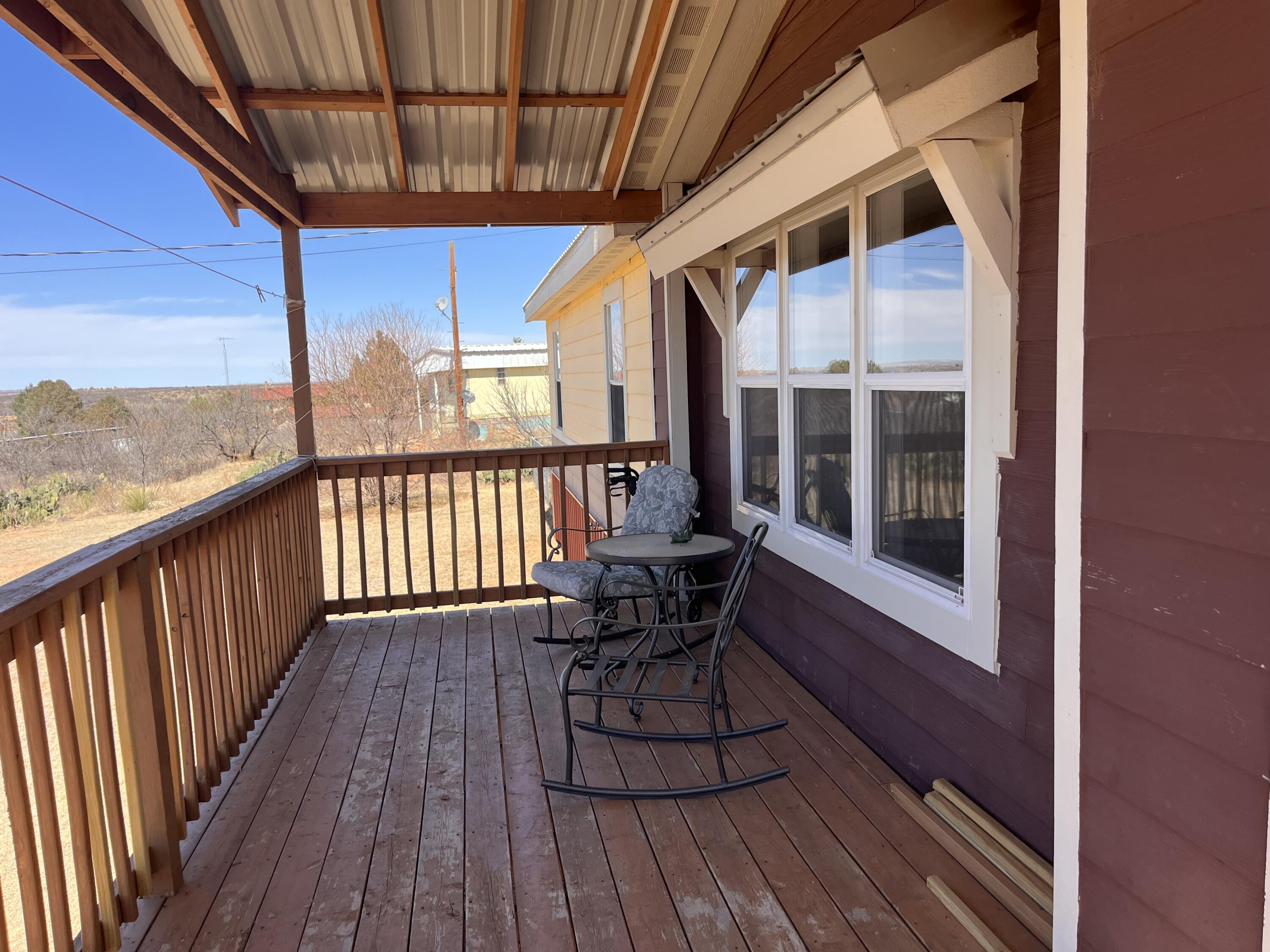 35 Rangeview Road Spur, TX 79370 - Photo 26 of 36 a view of a balcony with chairs