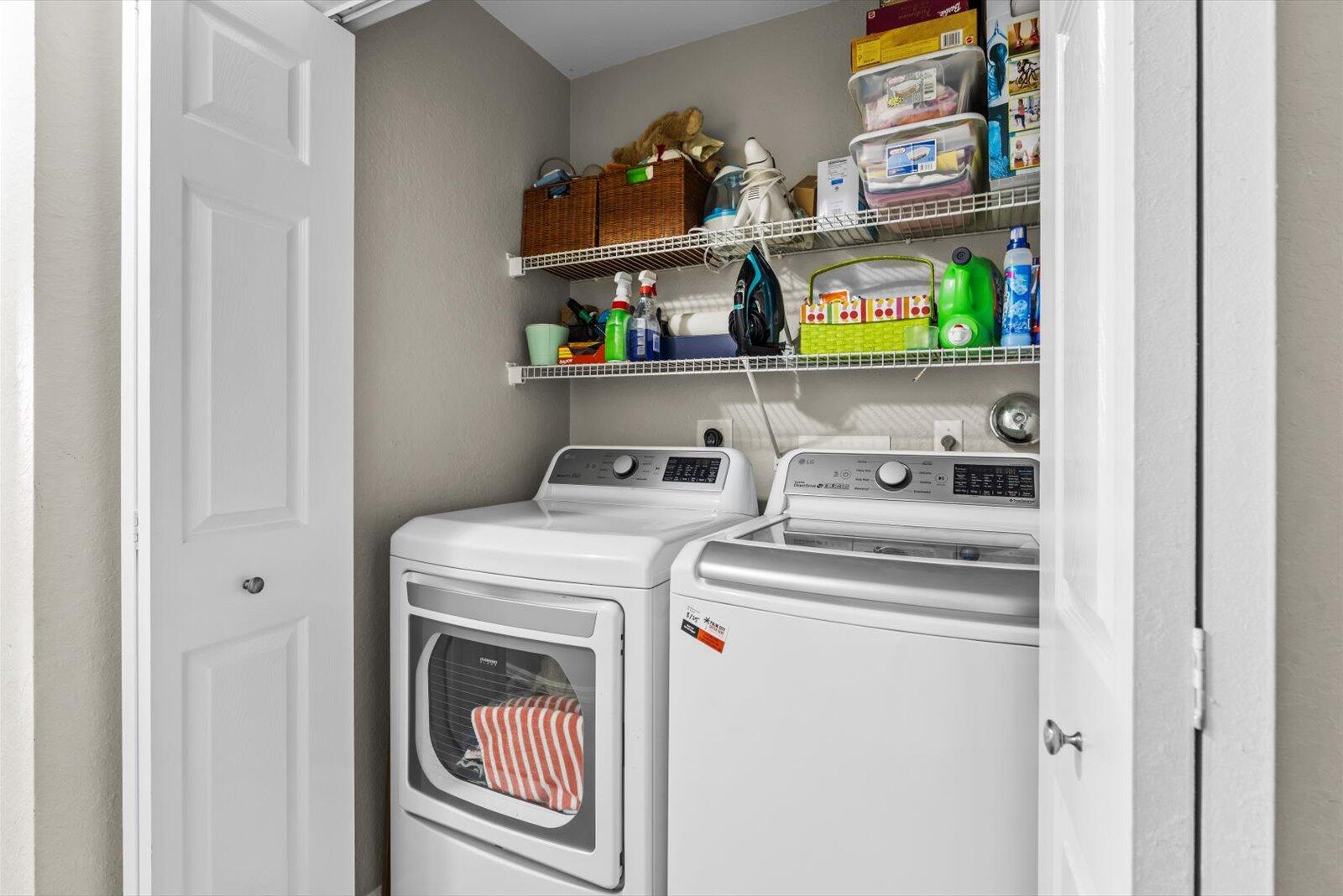 5290 Southeast Mitchell Lane Stuart, FL 34997 - Photo 26 of 44 a utility room with dryer and washer